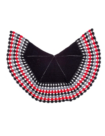 Flat lay of circular crochet cape scarf in black, red, and grey.