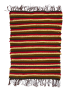 Full view of handmade earthy Kilim rug with red, brown, and yellow stripes.