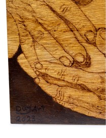 Woodburning Tableau Hands Holdiong A Child
