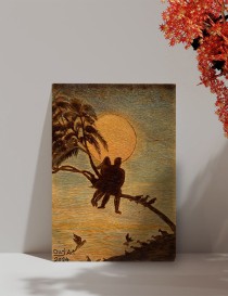 A4 wood burned artwork of two lovers sitting on a tree branch at sunset.