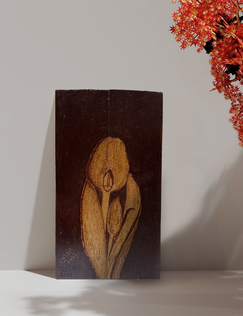Handcrafted Calla Lily pyrography artwork on an A4 wood panel against a neutral wall.