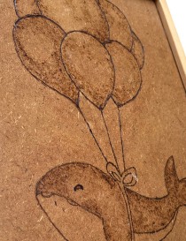Woodburning Tableau Dolphin and Balloons