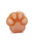 Peach-colored scented cat paw candle with pink toe beans and wick.
