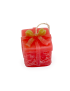 Top view of Christmas gift candle showing gold ribbon and wick.