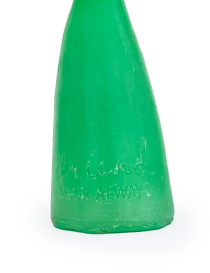 Close-up of "Friend for Always" engraving on green candle.