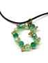 Detailed shot of faceted green crystals and gold bead accents.