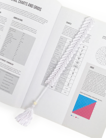 Pure white handmade crochet feather bookmark with a cream-colored bead.