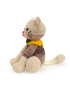 Left side profile of the sitting brown crochet cat showing its long tail.