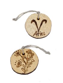 Aries zodiac symbol and wildflower bouquet wood-burned keychain.