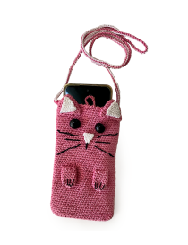 Detailed view of crochet kitty face with embroidered whiskers and 3D ears.