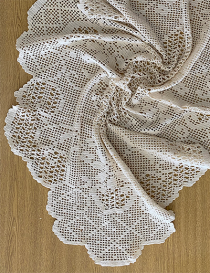 Geometric lace and floral pattern of vintage tablecloth