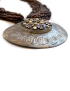 Beaded Necklace with Silver Decorated Ornament