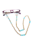 Gold eyeglass chain with turquoise beads and white butterfly charms.