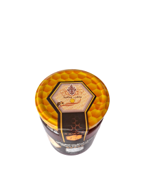 Top view of Safita honey jar showing honeycomb design lid.