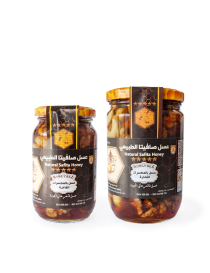 Comparison of 500g and 900g Safita Honey with Mixed Nuts jars.
