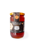 900g large jar of Natural Safita Thistle Honey showing light amber color.