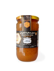 Jar of Natural Safita Crystallized Thistle Honey with golden label.