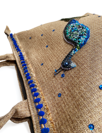 Close-up of artisan craftsmanship and textured jute fabric.