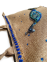 Close-up of artisan craftsmanship and textured jute fabric.