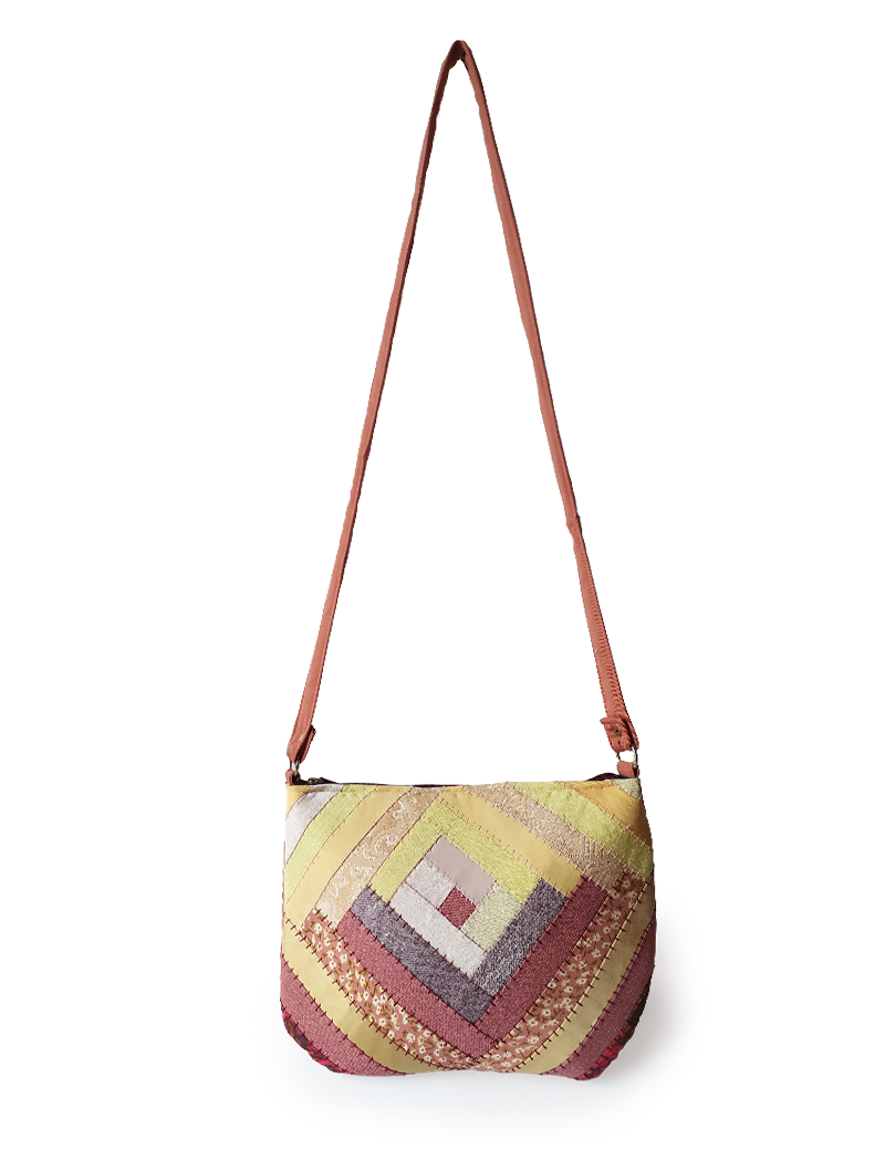 Front view of Fazlakat brown handmade crossbody bag.