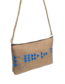 Angled view of Cuneiform embroidery and braided rope handle attachment.