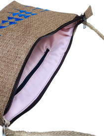 Interior view showing soft pink lining and internal security zipper.