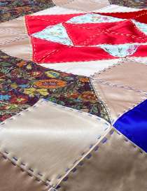 Perspective view of the handmade patchwork and embroidery.