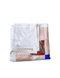 Folded tapestry showing contrast between front and linen back.