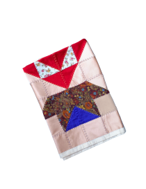 Compact view of the geometric patterns and artisan stitching.