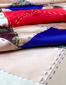 Side view showing the texture of layered fabrics and the raw linen backing.