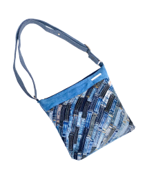 Upcycled jeans loop bag shown with the strap adjusted to shoulder length.