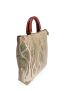 Perspective view of the luxury tote with polished wooden handles.