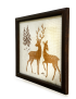 Side view of rustic dark wood frame with deer embroidery wall art.