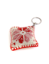 Handmade embroidered pillow keychain with metal ring for Syria gift delivery.