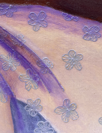Close-up of 3D metallic floral patterns on painted canvas.