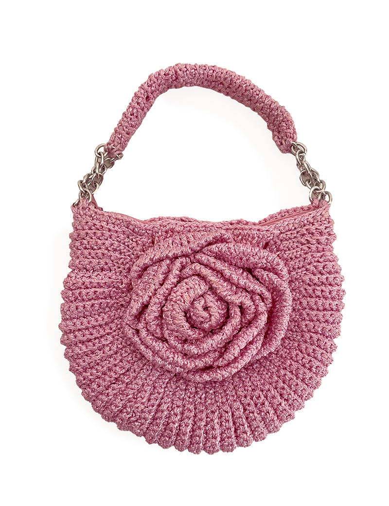 Rose pink crochet handbag with 3D floral rose motif and chain handle.