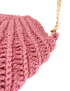 Close-up of high-quality ribbed crochet stitching and gold chain.