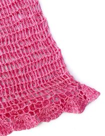 Ruffled bottom hem and delicate stitch work of pink summer dress.