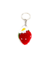 Handmade red strawberry crochet keychain with white flower and silver ring on white background.