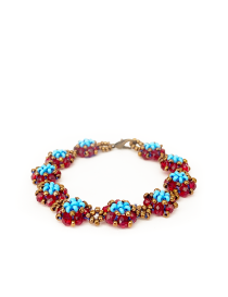 High-angle view of the handcrafted Ruby Bloom bracelet.
