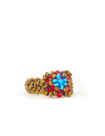 Close-up of a handcrafted floral bead cluster ring with a textured bronze beaded band.