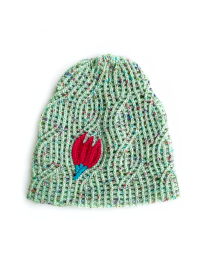 Handmade pistachio green crochet beanie with fuchsia tulip embroidery for Syria delivery.