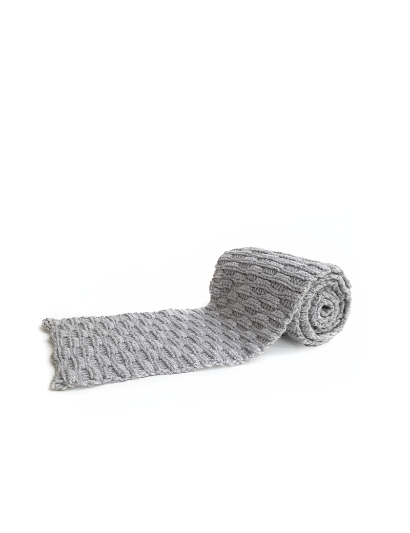 Rolled light grey crochet wool scarf for winter delivery in Syria