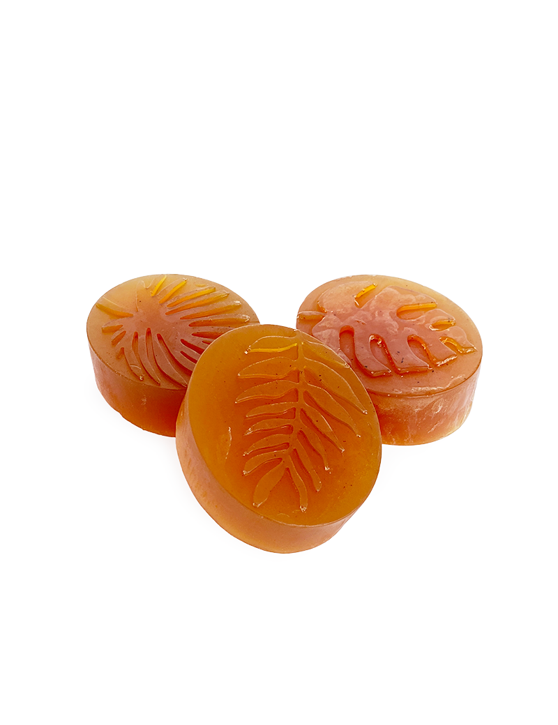 Three handmade glycerin and licorice soaps with decorative leaf patterns for gift delivery Syria
