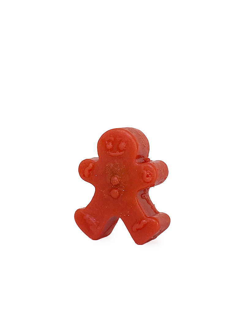 Red gingerbread man shaped glycerin soap for holiday gift delivery in Syria.