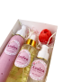 Close-up of Azalea Beauty Products labels on luxury pink and gold cosmetic bottles.