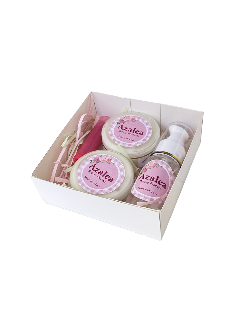 Azalea Beauty gift set in a fancy decorative box featuring day cream, night cream, and lip balm.