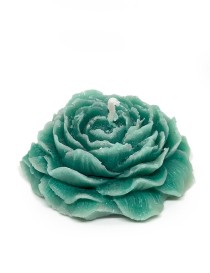 Detailed teal peony-shaped sculptural wax candle on a white background.