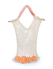 Beige cotton crochet net market bag with pink chevron handles containing oranges.