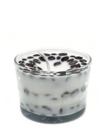 Handmade white soy candle in a glass jar decorated with whole roasted coffee beans.